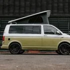 Driver side view of Spartan T6.1 LWB Campervan in Candy White and Military Green