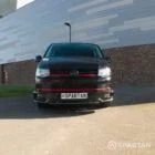 Volkswagen T6 Highline campervan in Deep Black, fully converted and ready for adventure with a stylish burgundy interior.