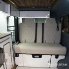 Copper Bronze VW T6.1 LWB campervan showing the Interior - Rock and Roll bed