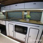 Copper Bronze VW T6.1 LWB campervan showing the Interior - Microwave