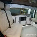 Copper Bronze VW T6.1 LWB campervan showing the Interior - SPARTAN swivel front bench seat