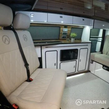 Copper Bronze VW T6.1 LWB campervan showing the Interior - SPARTAN swivel front bench seat