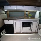 Copper Bronze VW T6.1 LWB campervan showing the Interior - Kitchen