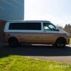 Copper Bronze VW T6.1 LWB campervan showing the driver side on poptop down