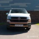 Copper Bronze VW T6.1 LWB campervan showing the front straight on poptop down