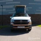 Copper Bronze VW T6.1 LWB campervan showing the front straight on poptop up