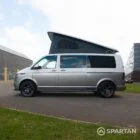 Squirrel Grey VW T6 SWB campervan showing the passenger side on poptop up