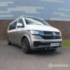 Squirrel Grey VW T6 SWB campervan showing the front driver quarter poptop down