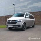 Squirrel Grey VW T6 SWB campervan showing the front/passenger quarter poptop down