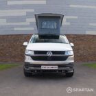 Squirrel Grey VW T6 SWB campervan showing the front straight on poptop up