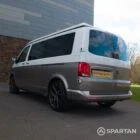 Squirrel Grey VW T6 SWB campervan showing the rear/passenger quarter poptop down