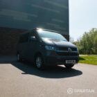 Front driver quarter view of VW T6.1 Spartan Campervan with poptop down