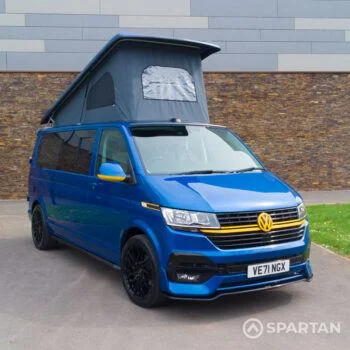 Front driver quarter view of VW T6.1 LWB with poptop down – the ultimate money shot