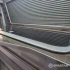 Integrated sink and hob set in latte kitchen on winter floor in VW T6.1 SWB campervan
