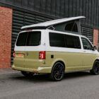 Rear driver quarter view of VW T6 Spartan Campervan with poptop up