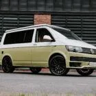Front driver quarter view of VW T6 Spartan Campervan with poptop down
