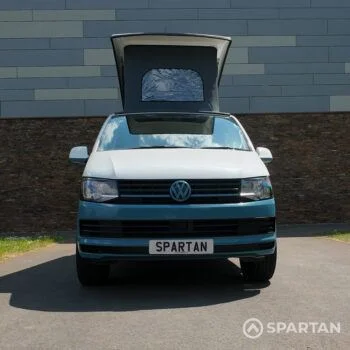 Spartan Campers VW Transporter T6 SWB campervan with raised poptop, front view showing its signature two-tone design