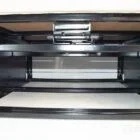 Spacious underbed storage compartment in Spartan campervan, expertly designed for maximum functionality and neat organisation