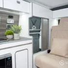 Sleek Spartan-built wardrobe offering seamless storage inside the campervan