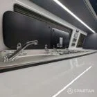Integrated stainless steel sink and hob set in storm cloud grey worktop with blizzard floor