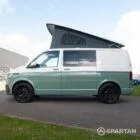 Full passenger side profile of VW T6.1 Spartan camper in sage green with roof up