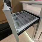 Spartan campervan kitchen with premium white gloss and poppy red splashback FL73HBK