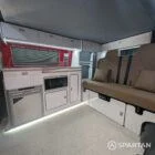 Spartan campervan kitchen with premium white gloss and poppy red splashback FL73HBK