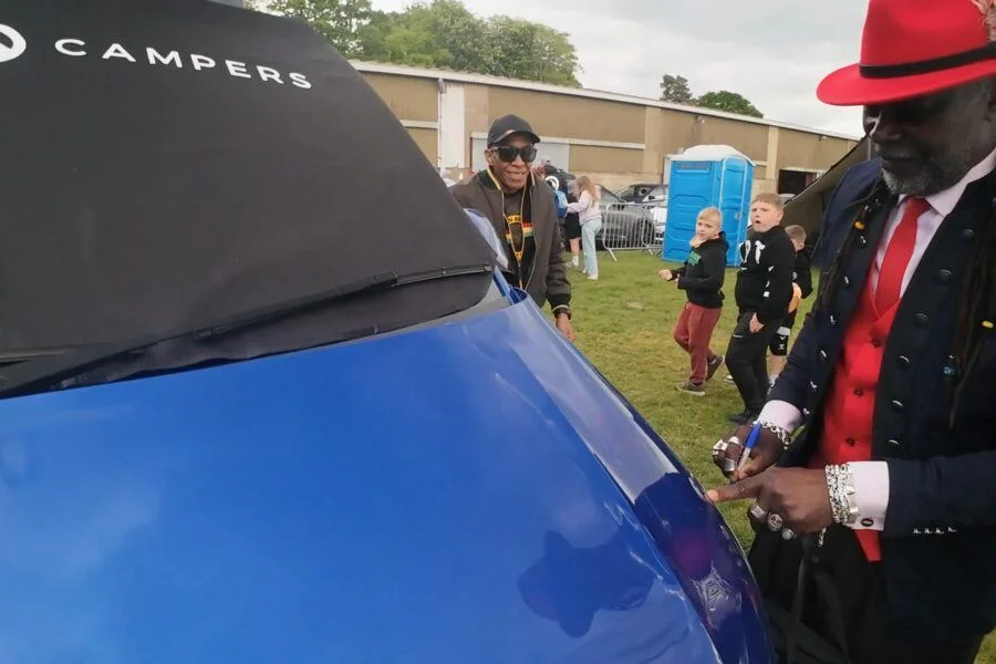 Levi Roots from dragons den signs a spartan campervan