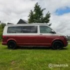 Driver side view of VW T6.1 Business Pack LWB campervan with pop-top down, Fortana Red and Candy White