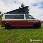 Driver side view of VW T6.1 Business Pack LWB campervan with pop-top up, Fortana Red and Candy White