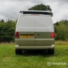 Straight rear view of VW T6.1 LWB campervan with pop-top up, Military Green and Candy White