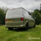 Rear driver quarter of VW T6.1 LWB campervan with roof down, Military Green and Candy White