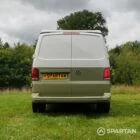 Rear view of VW T6.1 LWB campervan with pop-top down, Military Green and Candy White
