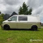 Passenger side view of VW T6.1 LWB campervan with roof down, Military Green and Candy White