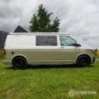 Driver side view of VW T6.1 LWB campervan with pop-top down, Military Green and Candy White