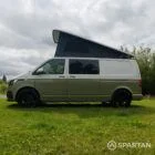 Passenger side view of VW T6.1 LWB campervan with pop-top up, Military Green and Candy White