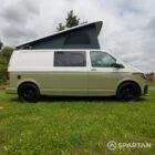 Driver side view of VW T6.1 LWB campervan with pop-top up, Military Green and Candy White