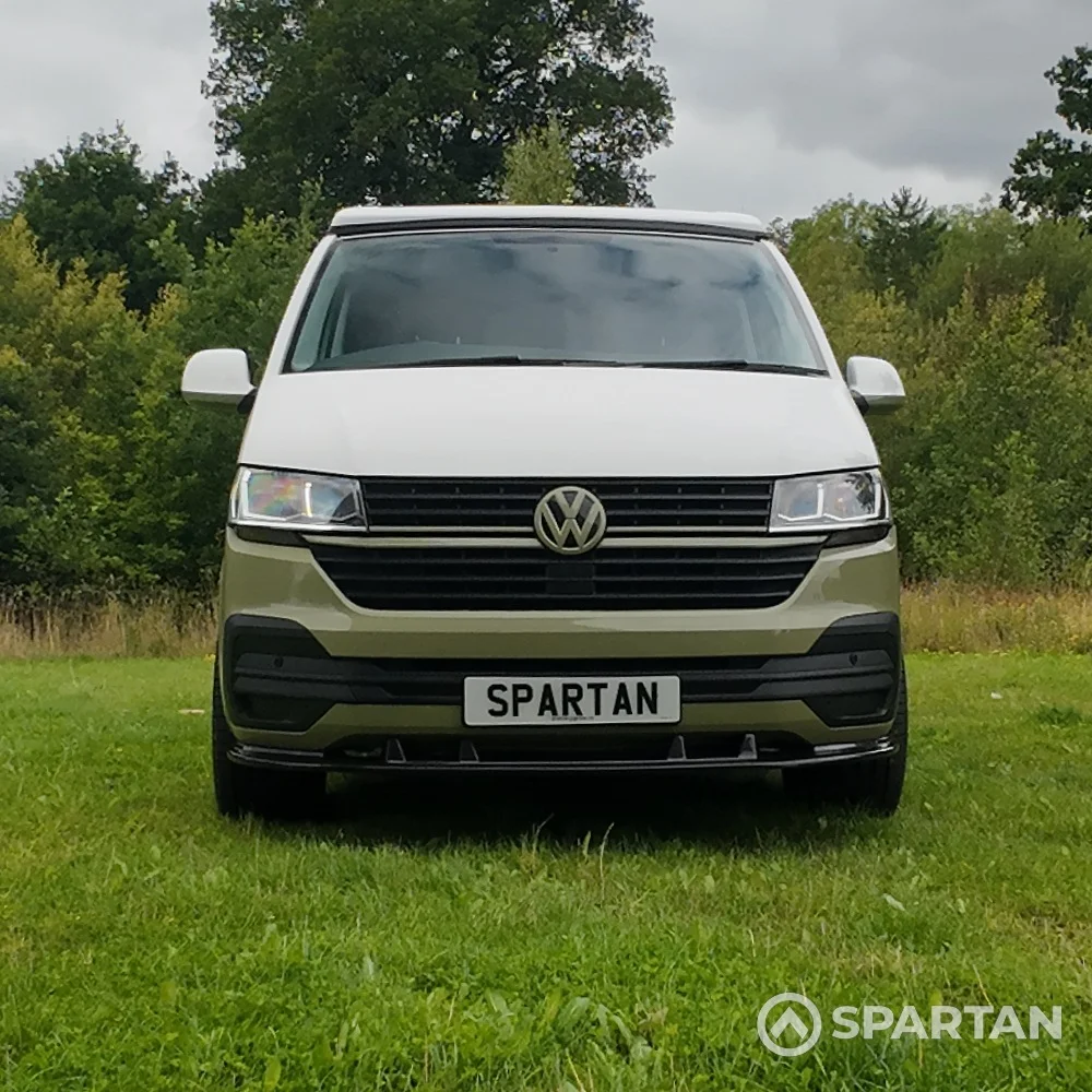 Front view of VW T6.1 LWB campervan with pop-top down, Military Green and Candy White