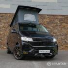 Spartan VW T6.1 Highline Deep Black Pearl camper front 3/4 view with wheel turned in WK72VDP