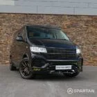 Spartan VW T6.1 Highline Deep Black Pearl camper front 3/4 view with wheel turned in WK72VDP
