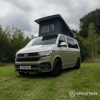 Front passenger quarter of VW T6.1 Highline SWB campervan with pop-top up, Military Green and Candy White