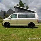 Passenger side view of VW T6.1 Highline SWB campervan with pop-top up, Military Green and Candy White