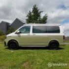 Passenger side view of VW T6.1 Highline SWB campervan with roof down, Military Green and Candy White