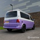 Vw T6.1 SWB Spartan campervan conversion. Rear driver quarter with pop top roof down
