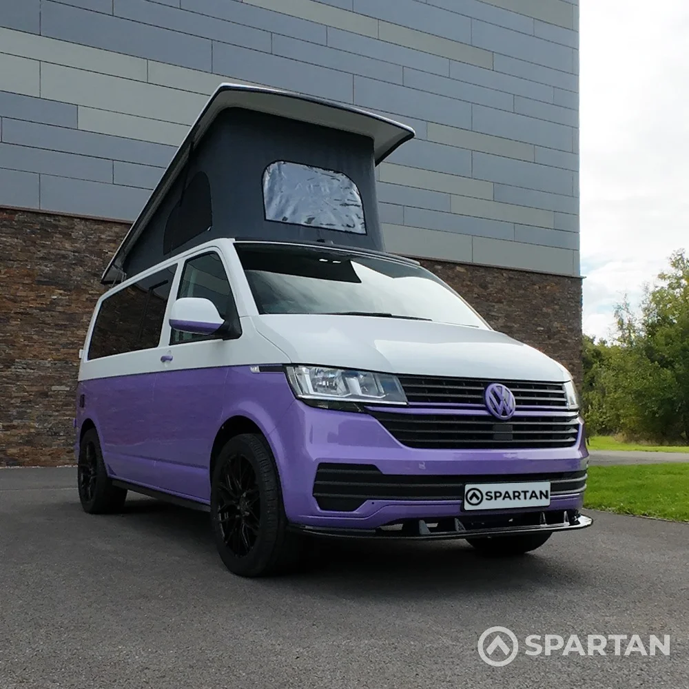 Vw T6.1 SWB Spartan campervan conversion. Front driver quarter with pop top roof up
