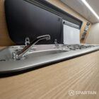 Integrated sink and hob in VW T6.1 Highline SWB campervan kitchen with oak finishes