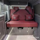 Ruby red upholstered rock and roll bed in VW T6.1 Business Pack LWB campervan