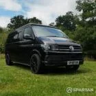 VW T6 LWB Deep Black campervan front driver quarter view poptop down