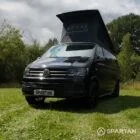 VW T6 LWB Deep Black campervan front passenger quarter view poptop up