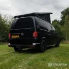 VW T6 LWB Deep Black campervan rear driver quarter view poptop up
